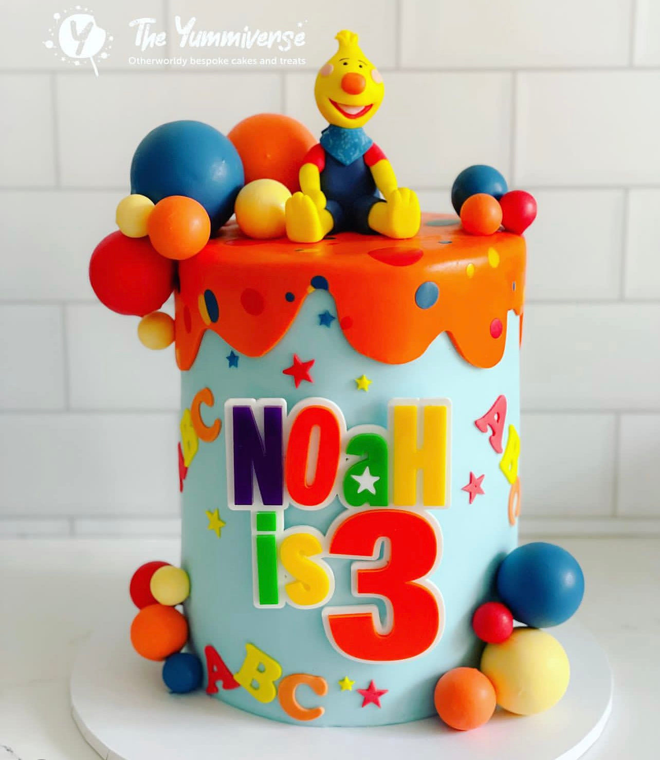 Colourful name charm