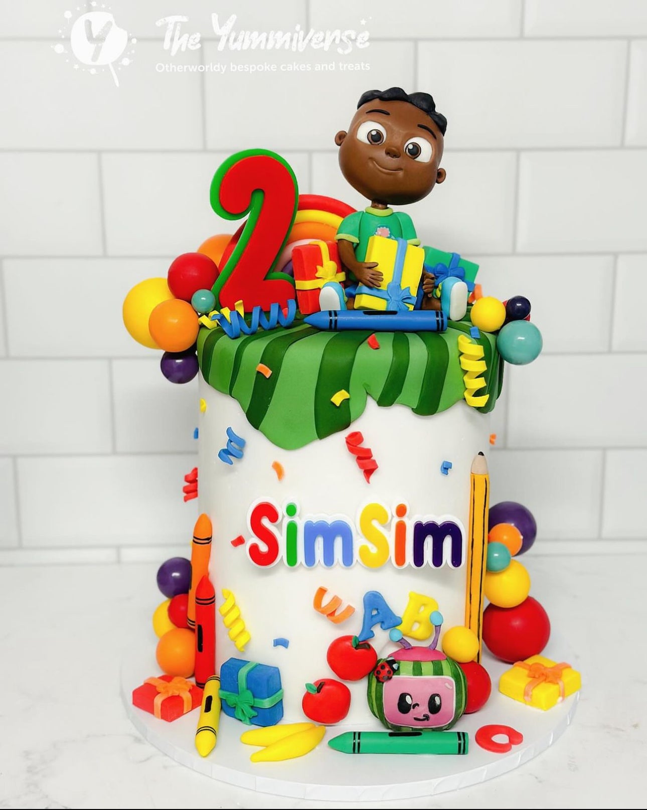 CocoMelon themed name charm and age topper