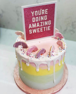 Message card cake topper