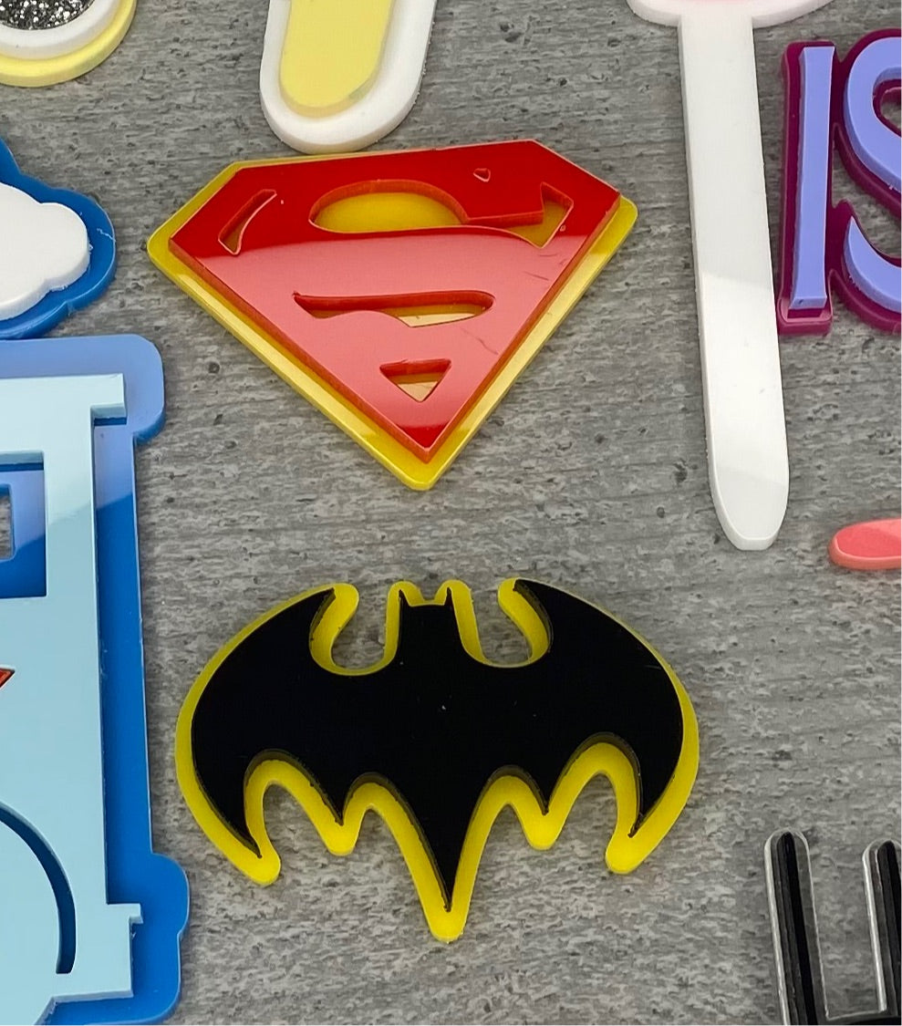 Superman/Batman charm