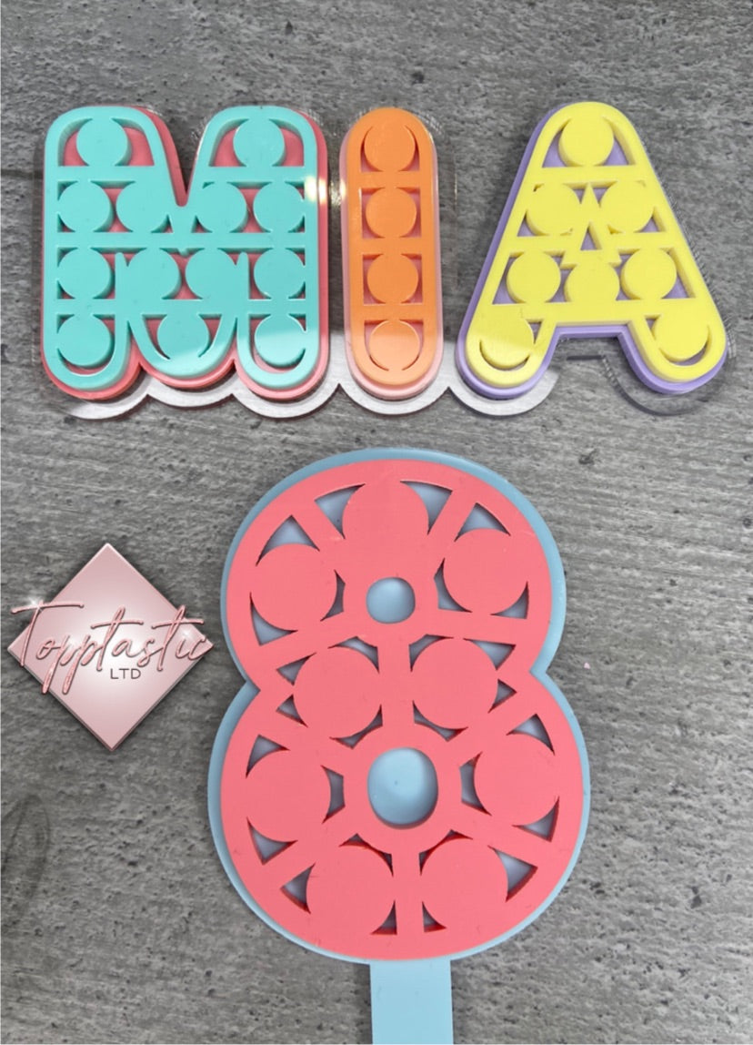 Pop-It Themed topper/ charm